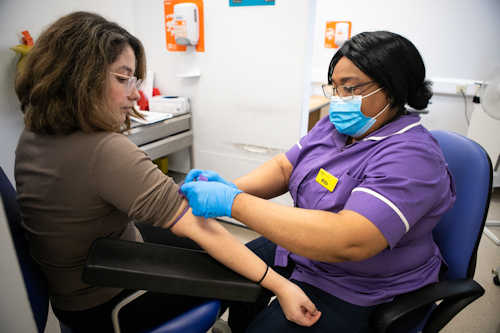 Midwife taking blood